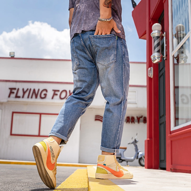 Jean extensible déchiré à la cheville pour hommes de grande taille 